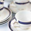 dsc_2107-scaled-1.jpg Juego de café de porcelana blanca con filo de oro y azul cobalto (27 piezas) Royal Blue, 12 tazas de café, 12 platillos para tazas, 1 azucarero, 1 cafetera, 1 cremera, diseño clásico